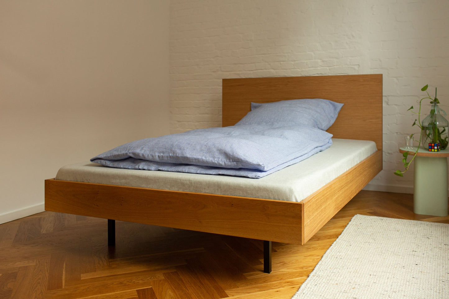 
                  
                    Unidorm Eiche - Holzbett mit Kopfteil 140 x 200 cm
                  
                