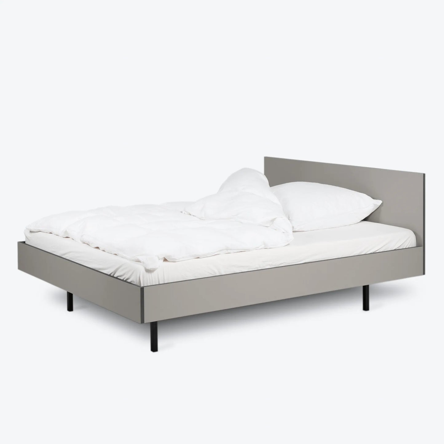 graues Linoleumbett von Bartmann mit weißen hintergurnd